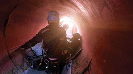 Workers inside a confined space.