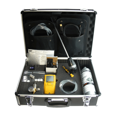 Open black carrying case containing various equipment, including a yellow BW Honeywell GasAlert Max XT II device, model XT-XWHM-Y-NA-CS, cables, a small flashlight, gas canister, and assorted small components organized in foam compartments for a complete confined space gas monitoring kit.
